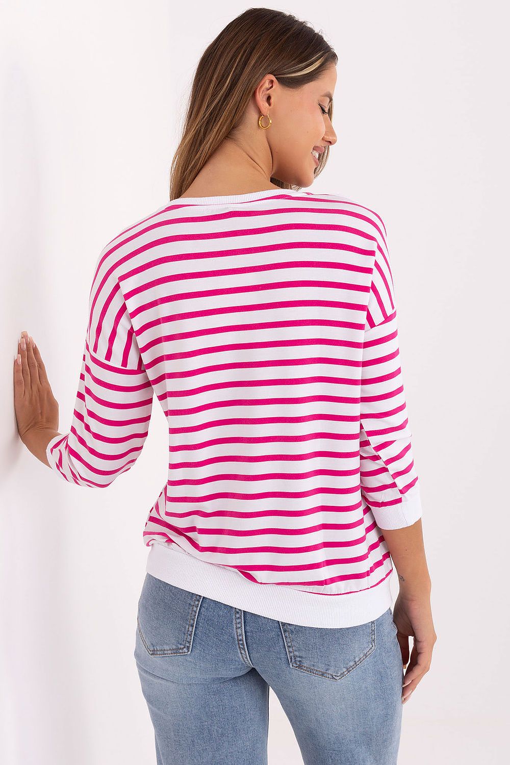 Chic Relevance blouse in soft micromodal, featuring elbow-length sleeves and a unique striped pattern, perfect for enhancing chic casual outfits.