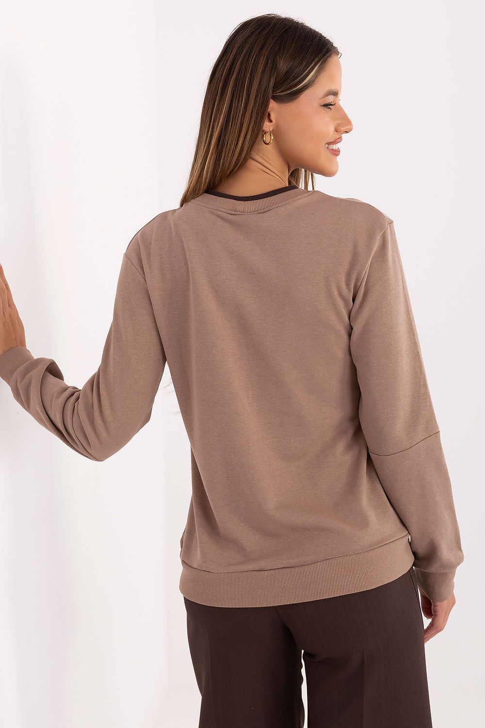 Luxurious cotton-polyester women's sweatshirt from Relevance, showcasing long sleeves and an elegant fit, perfect for a chic casual look.