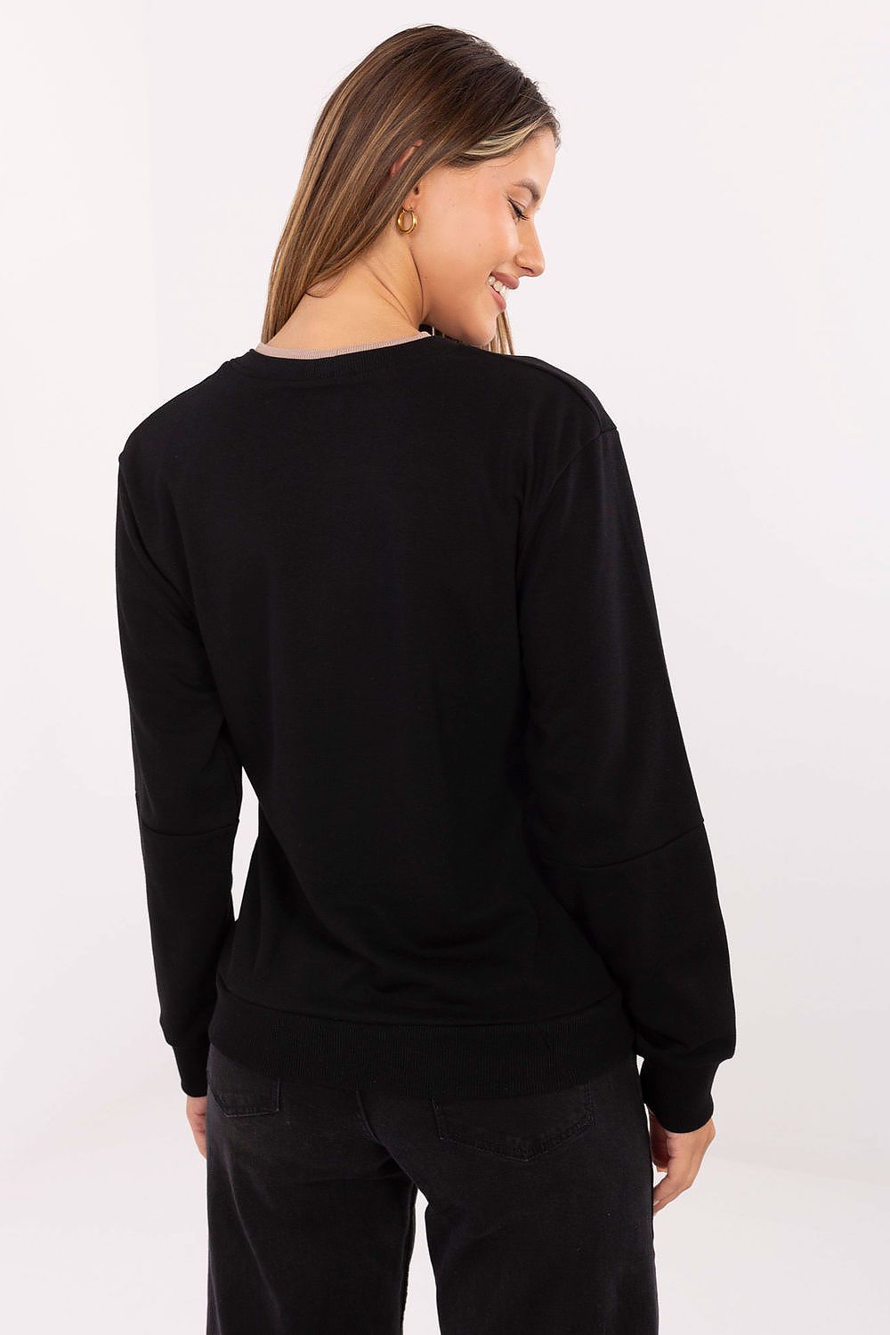 Chic women's sweatshirt by Relevance, featuring subtle embroidery and patches, crafted for both comfort and luxury in casual wear.