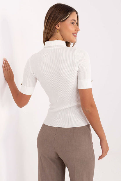 Stylish model wearing an elegant women's turtleneck sweater from Factory Price, ideal for pairing with skirts and tailored trousers.