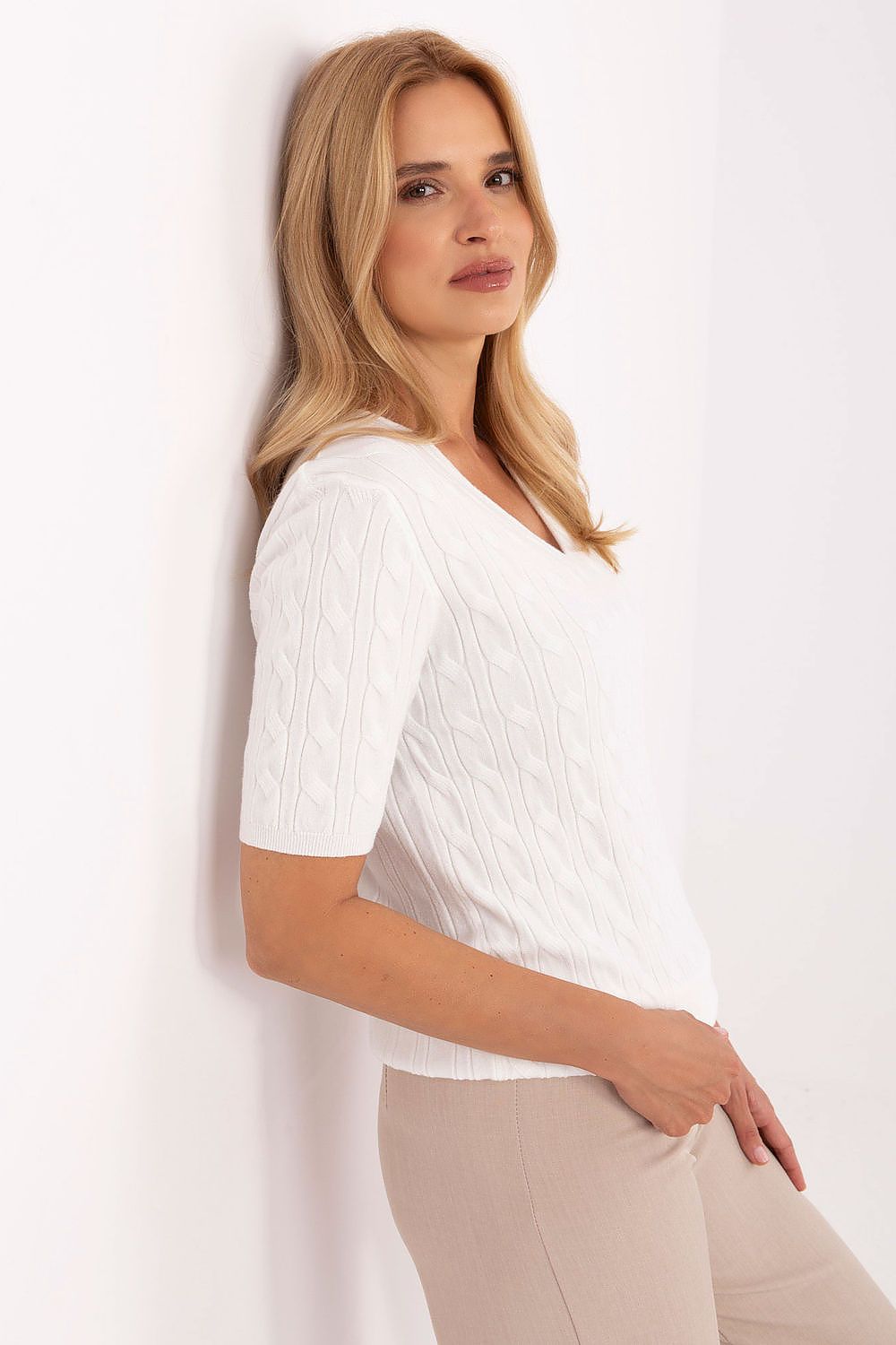 Chic casual women's sweater in EU size 0 by Factory Price, showcasing a stylish V-neckline and versatile design for various outfits.