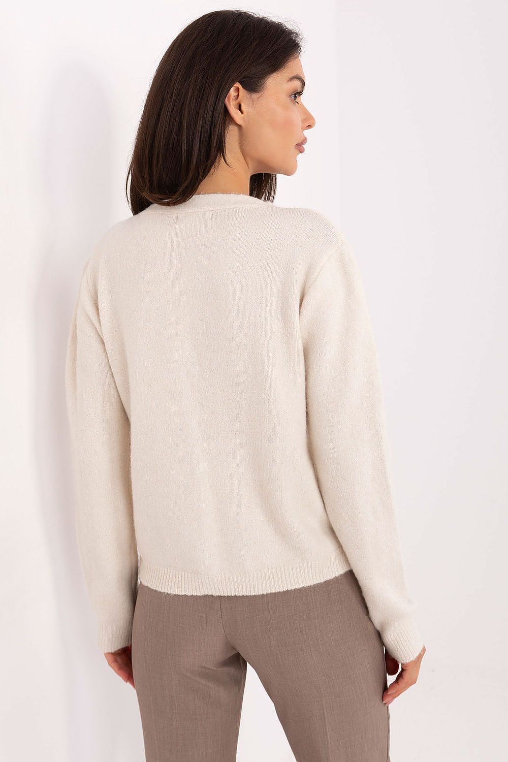 Close-up of lace detailing on the elegant cardigan sweater for women by Factory Price, showcasing quality craftsmanship and feminine design.