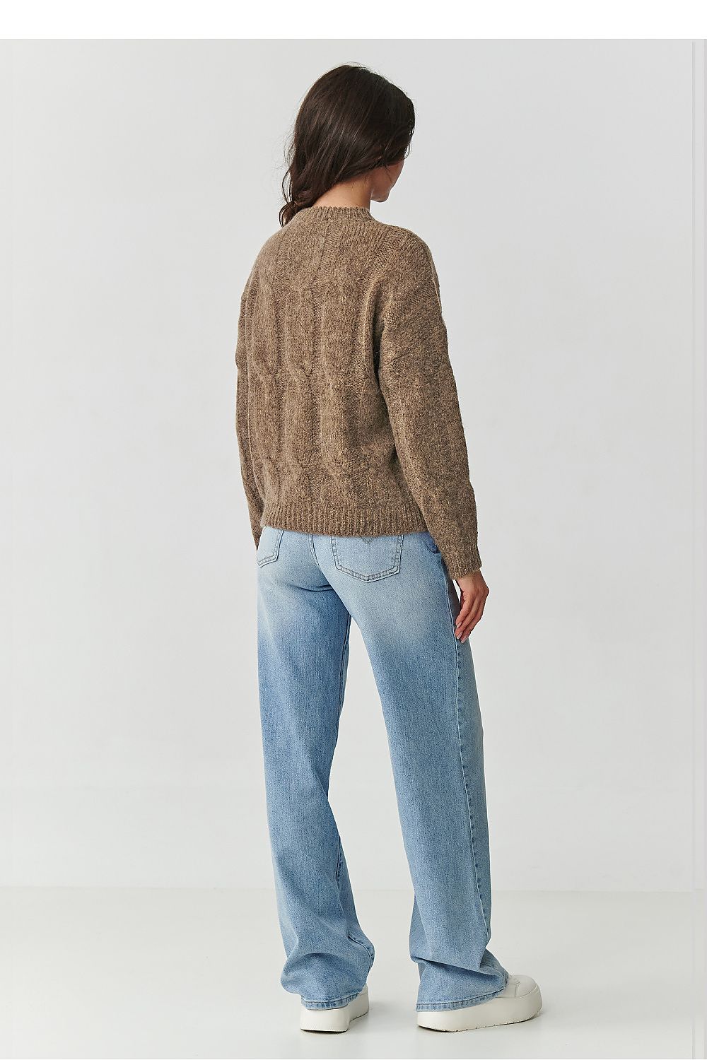 Makadamia luxury women's sweater, designed with a classic round neck and flattering loose fit, made from a warm, soft mohair blend ideal for any occasion.