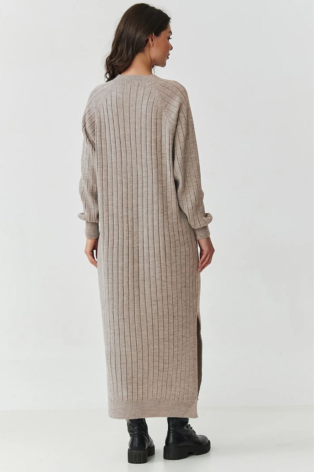 Stylish Makadamia long sweater dress showcasing a soft silhouette with practical side slits, ideal for versatile fashion in muted tones.