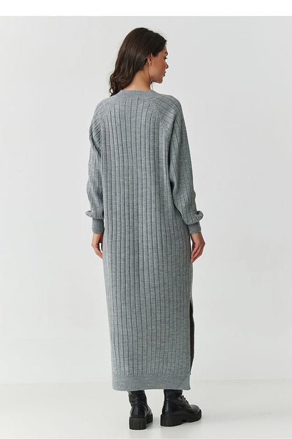 Makadamia Long Sweater Dress in elegant V-neck ribbed knit, showcasing a soft and luxurious design, perfect for stylish autumn outings.