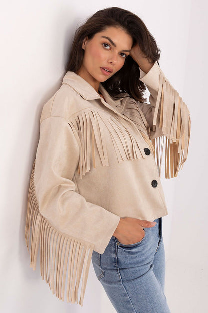 Elegant close-up of the fashionable fringes on the sleeve of a stylish women's transitional jacket from Factory Price.