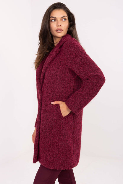 Elegant knee-length women's polyester coat with a furry effect, crafted by Factory Price, ideal for autumn and winter attire.