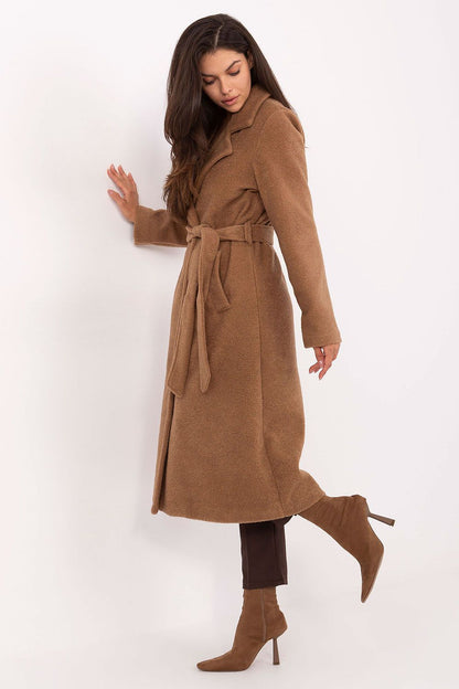 Double-breasted design of the women's boucle coat by Factory Price, featuring lapels and functional slip pockets for sophistication and practicality.