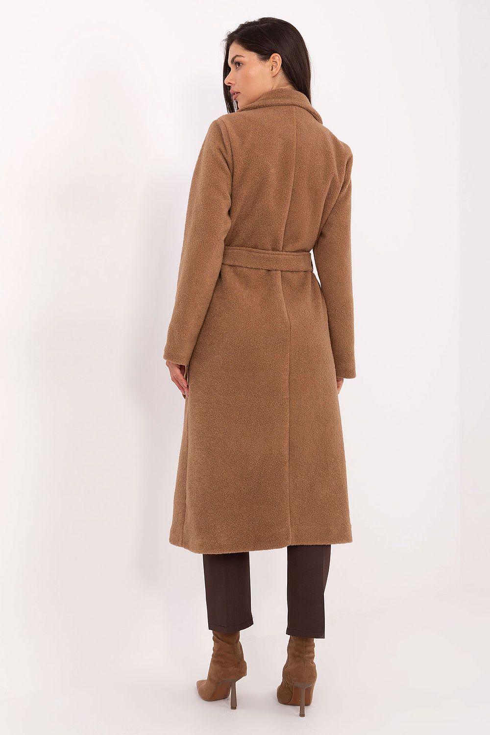 The feminine silhouette of Factory Price's boucle coat, cinched with a tie belt to accentuate the waist, perfect for transitional wear.