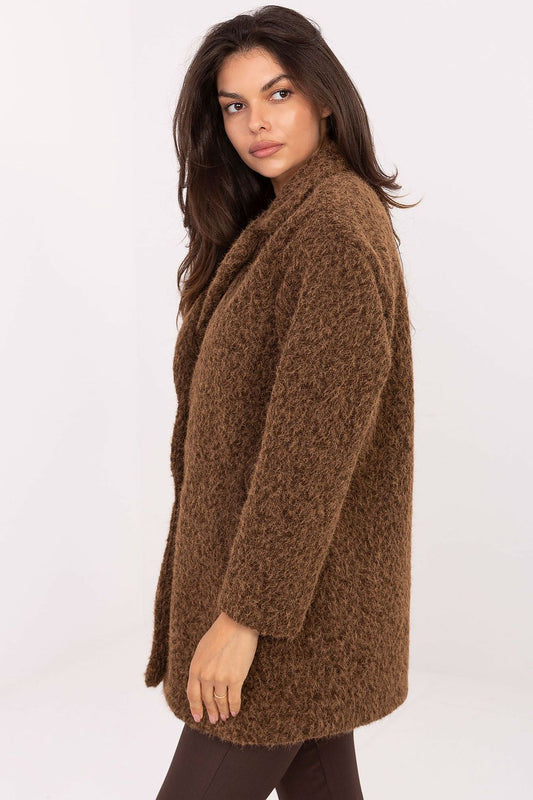 Luxurious polyester coat for women by Factory Price, showcasing a stylish mid-thigh length, practical inserted pockets, and a sophisticated button fastening, perfect for chic autumn outfits.