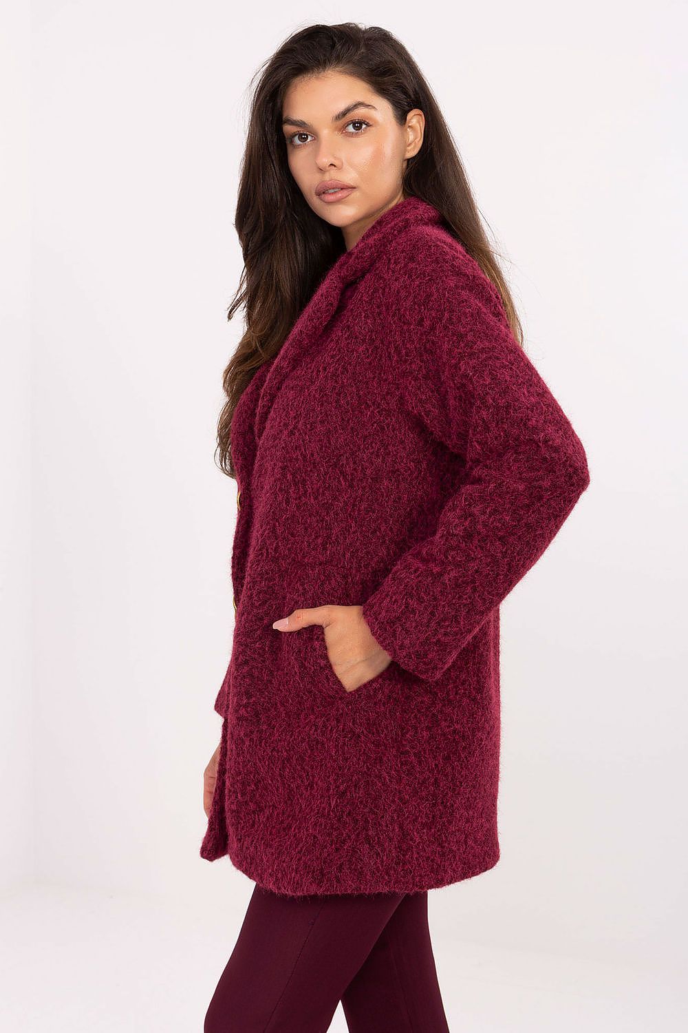 Stylish polyester women's coat by Factory Price, designed for autumn and winter, showcasing a sophisticated mid-thigh length and functional pockets for everyday elegance.