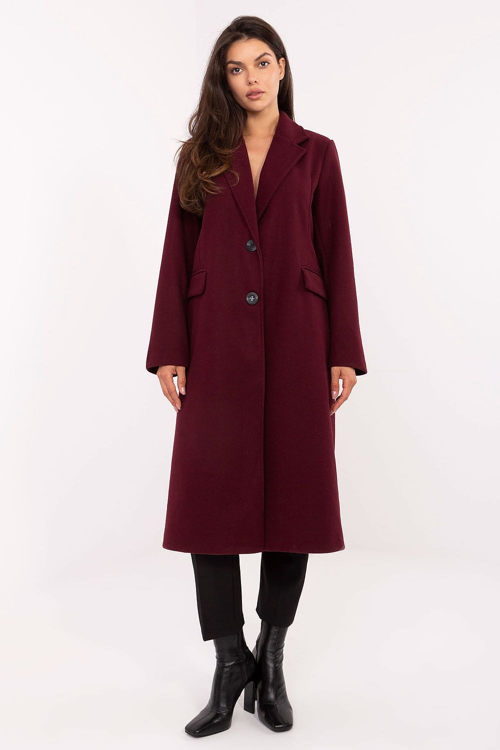 Stylish women's coat with defined shoulder pads and practical pockets, crafted by Factory Price for elegance and comfort.