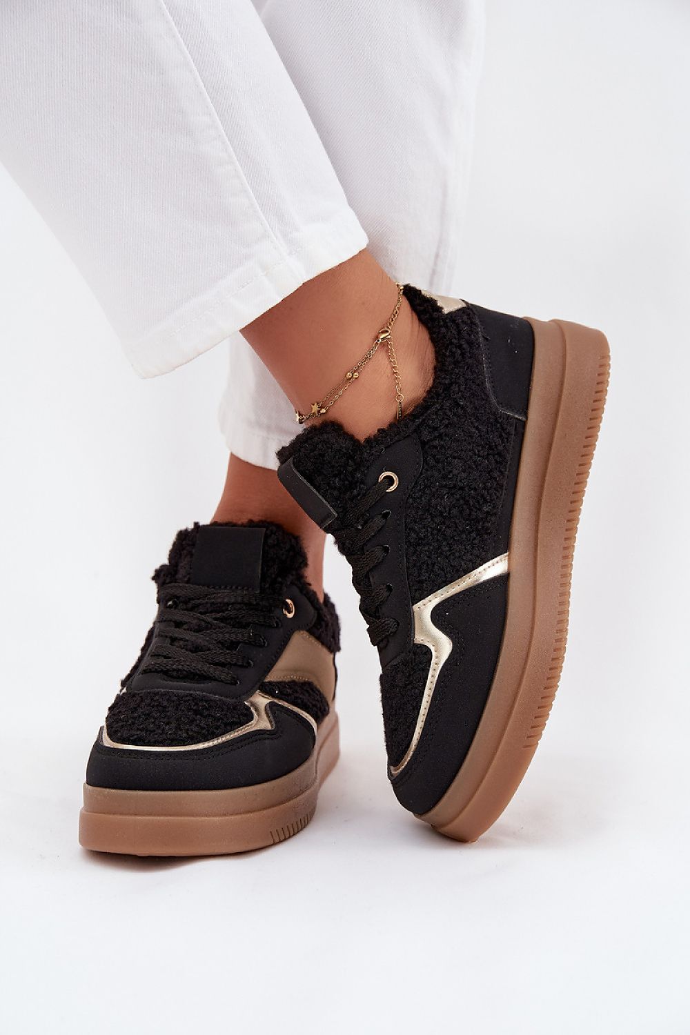 Elegant women's platform sneakers from Step in Style, featuring a chic design with a height-increasing platform perfect for winter.
