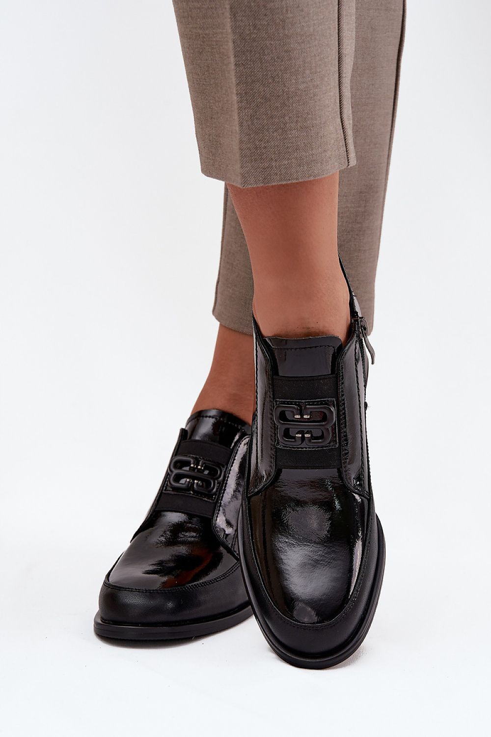 Close-up of Vinceza Women's Natural Leather Heeled Low Shoes showcasing the decorative front element, perfect for both casual and elegant settings, created by Step in Style.