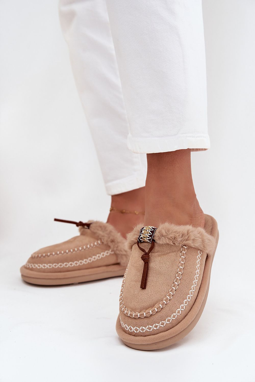 Luxury women's eco suede slippers by Step in Style, featuring elegant embroidery and a soft fur footbed for ultimate comfort.