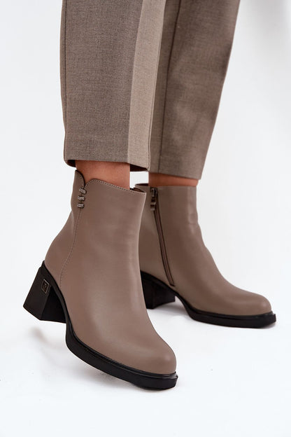 Elegantly designed women's natural leather heel boots by Step in Style, showcasing insulated comfort and a stylish block heel, perfect for chic autumn-winter outfits.