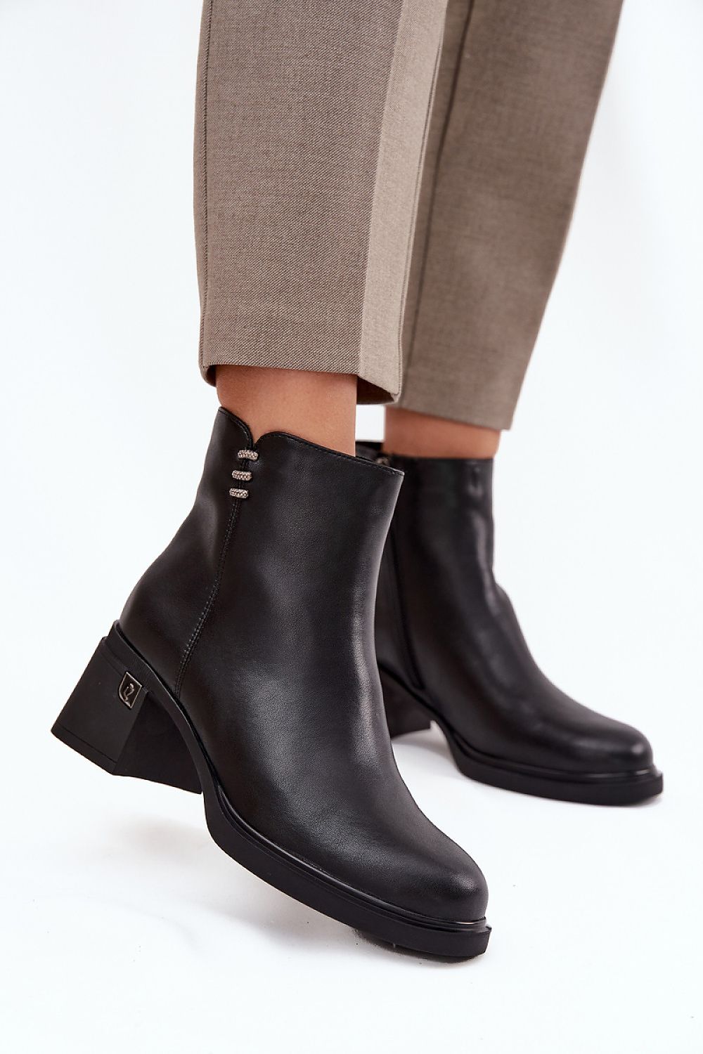 Chic insulated women's boots by Step in Style, crafted from natural leather with a delicate design, offering both comfort and elegance.