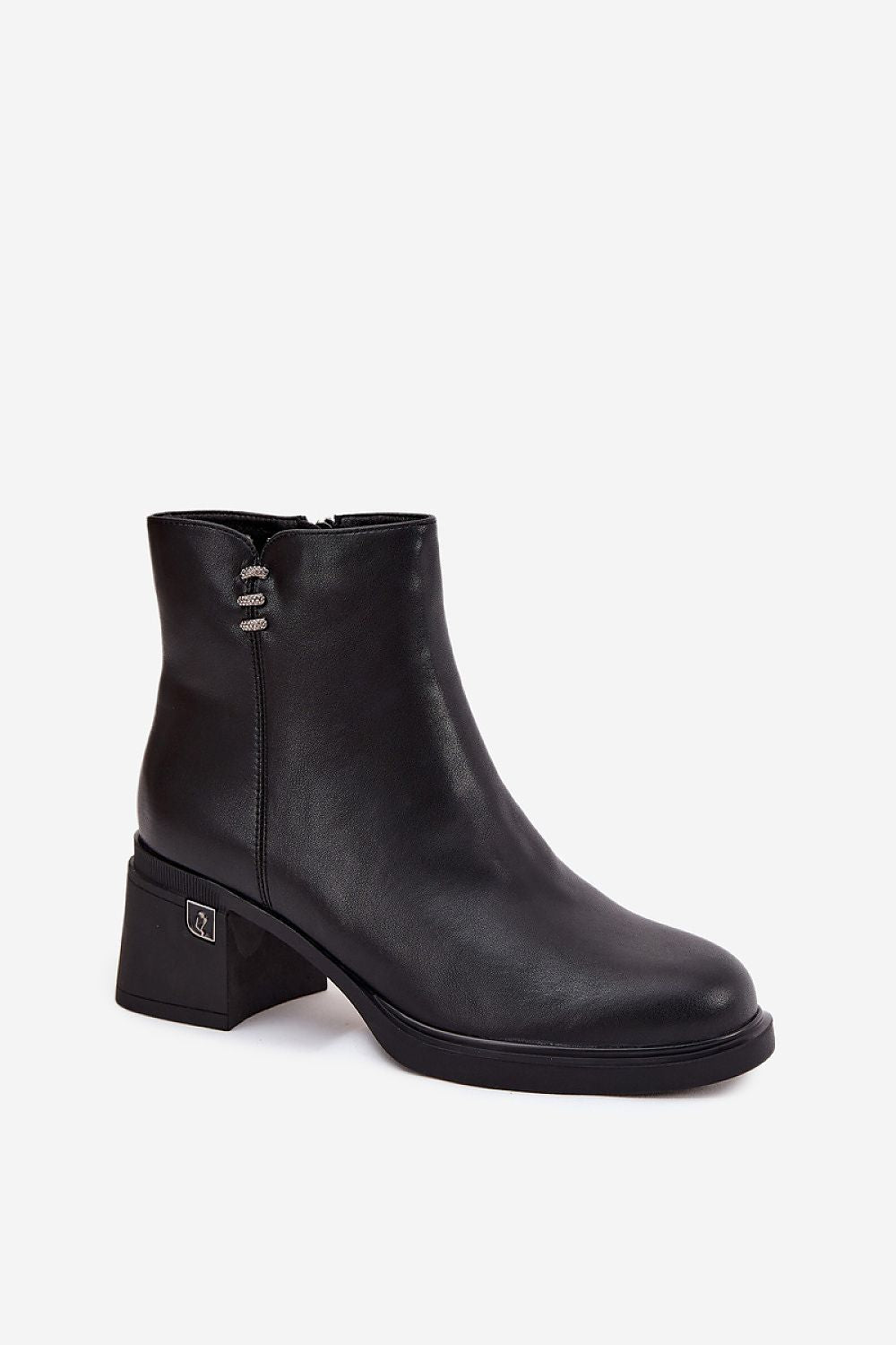 Stylish women's natural leather ankle boots from Step in Style, with block heels and a sophisticated look, suitable for various outfits.
