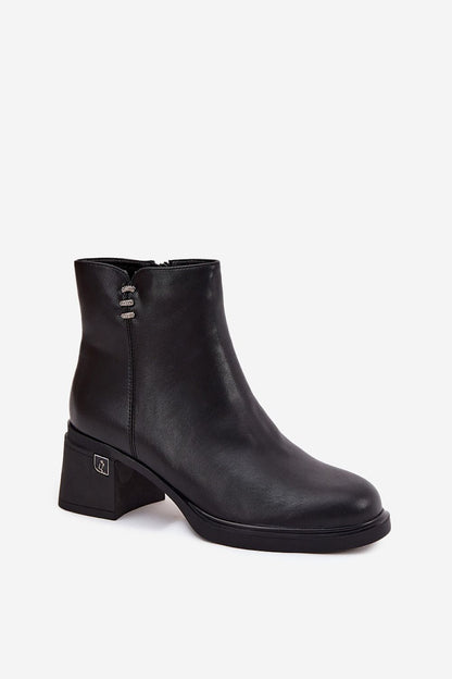 Stylish women's natural leather ankle boots from Step in Style, with block heels and a sophisticated look, suitable for various outfits.