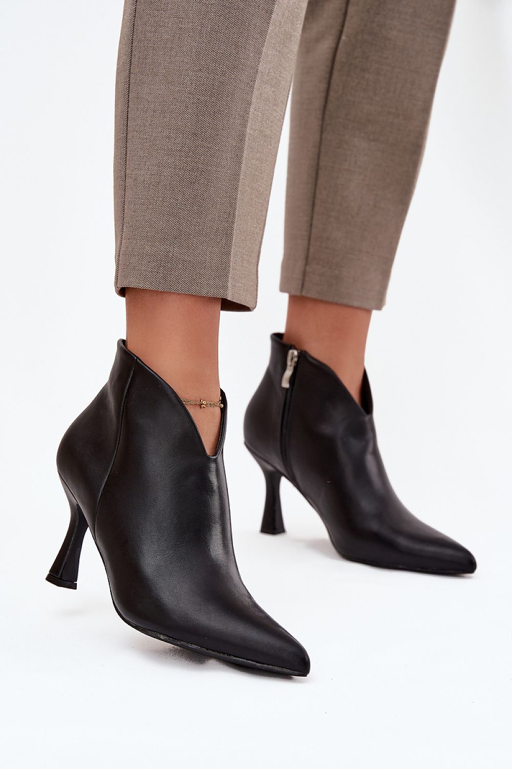 Elegant eco suede ankle heel boots with asymmetrical shaft by Step in Style, showcasing a chic design on a slender stiletto heel.