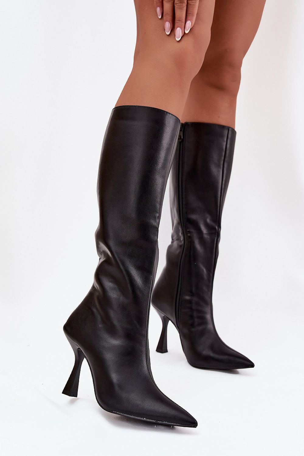 Elegant eco leather knee-high stiletto heel boots for women by Step in Style, showcasing a classic design with pointed toes and a sleek silhouette, perfect for sophisticated evening wear.