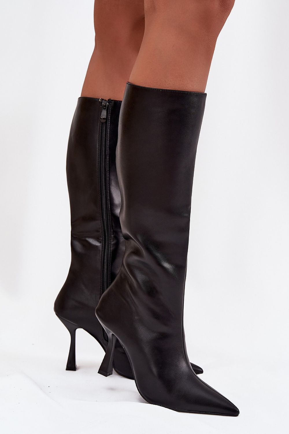 Stylish side view of women's knee-high stiletto heel boots by Step in Style, featuring a flattering high heel and an above-the-knee design that accentuates legs, ideal for luxury fashion enthusiasts.