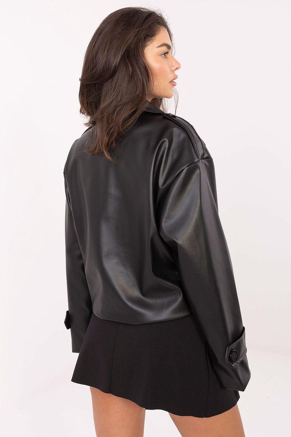 Fashionable urban styling with Rue Paris short women's trench coat in eco-leather, designed for elegance and comfort.