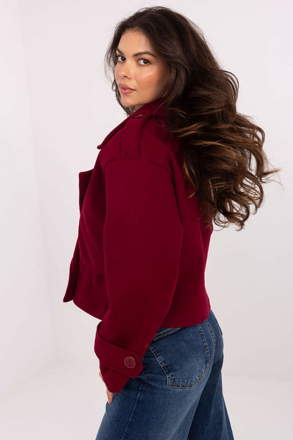 Close-up of Rue Paris women's trench coat, highlighting details such as wide lapels and luxurious smooth texture, ideal for casual elegance.