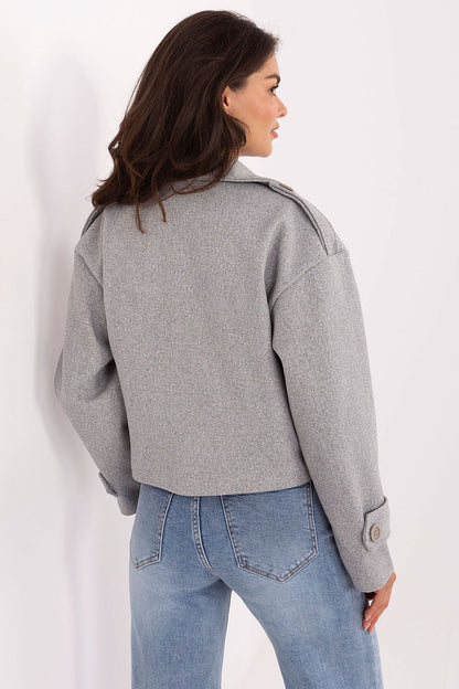 Stylish double-breasted short trench coat made from high-quality eco-leather by Rue Paris, designed for transitional seasons with a modern twist.