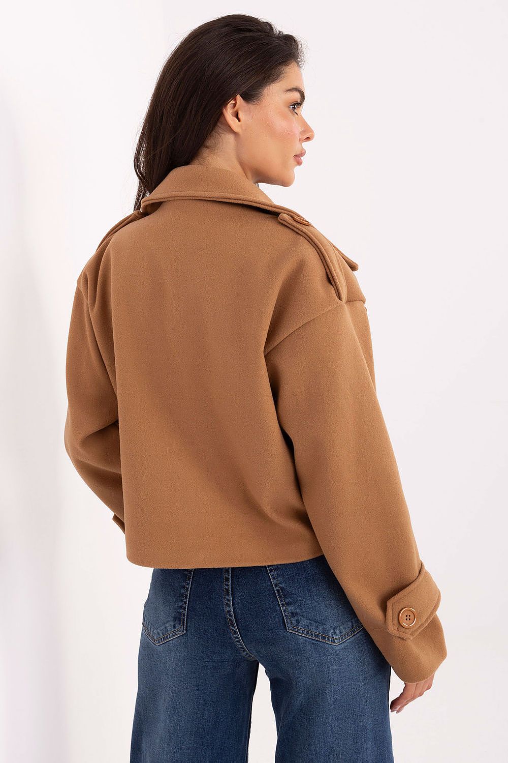 Elegant short trench coat for women by Rue Paris, crafted from eco-leather with a large collar and military epaulettes, designed for a stylish autumn/winter/spring look. Size EU 0.