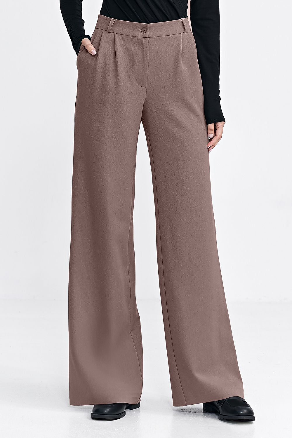 Elegant women's trousers by Nife with a relaxed fit, featuring decorative pleats and a wide leg, ideal for stylish comfort in UK sizes 4-10.