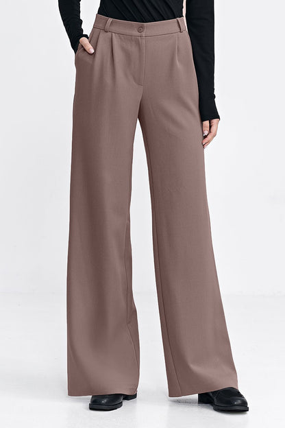 Elegant women's trousers by Nife with a relaxed fit, featuring decorative pleats and a wide leg, ideal for stylish comfort in UK sizes 4-10.