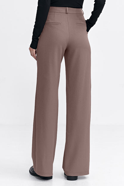 Stylish Nife women's trousers in elegant design, with functional pockets and decorative detailing, available in UK sizes 4-10 for a contemporary look.