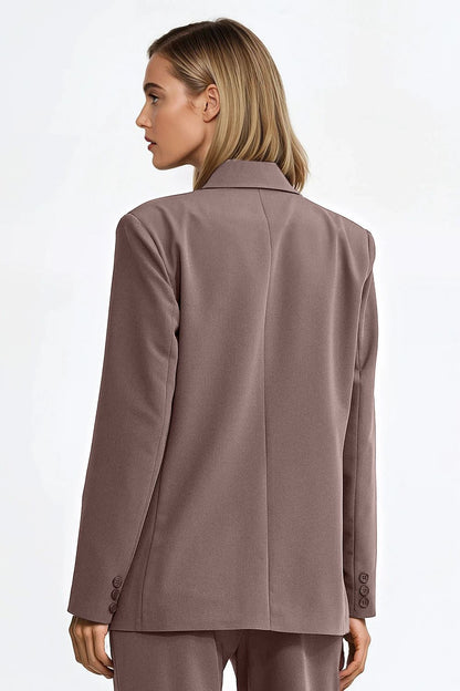 Stylish oversized blazer by Nife showcasing long sleeves with buttoned cuffs and shoulder pads for a beautifully shaped silhouette.
