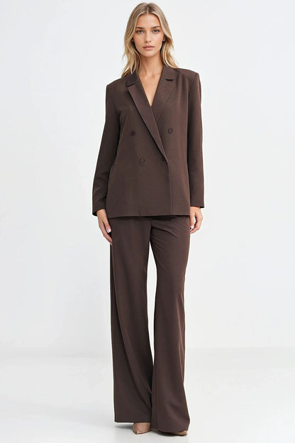 Sophisticated double-breasted blazer by Nife, showcasing versatility for pairing with jeans, trousers, or dresses for any occasion.