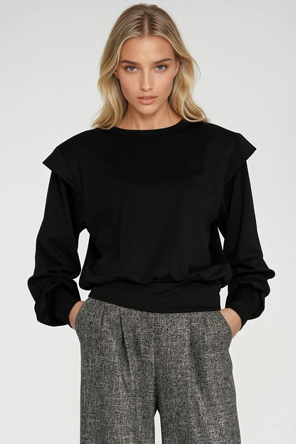 Luxurious elegant oversized women's sweatshirt by Nife featuring shoulder pads, round neckline, and dropped shoulder design, perfect for a stylish casual look. Available in sizes EU 36 to 42.