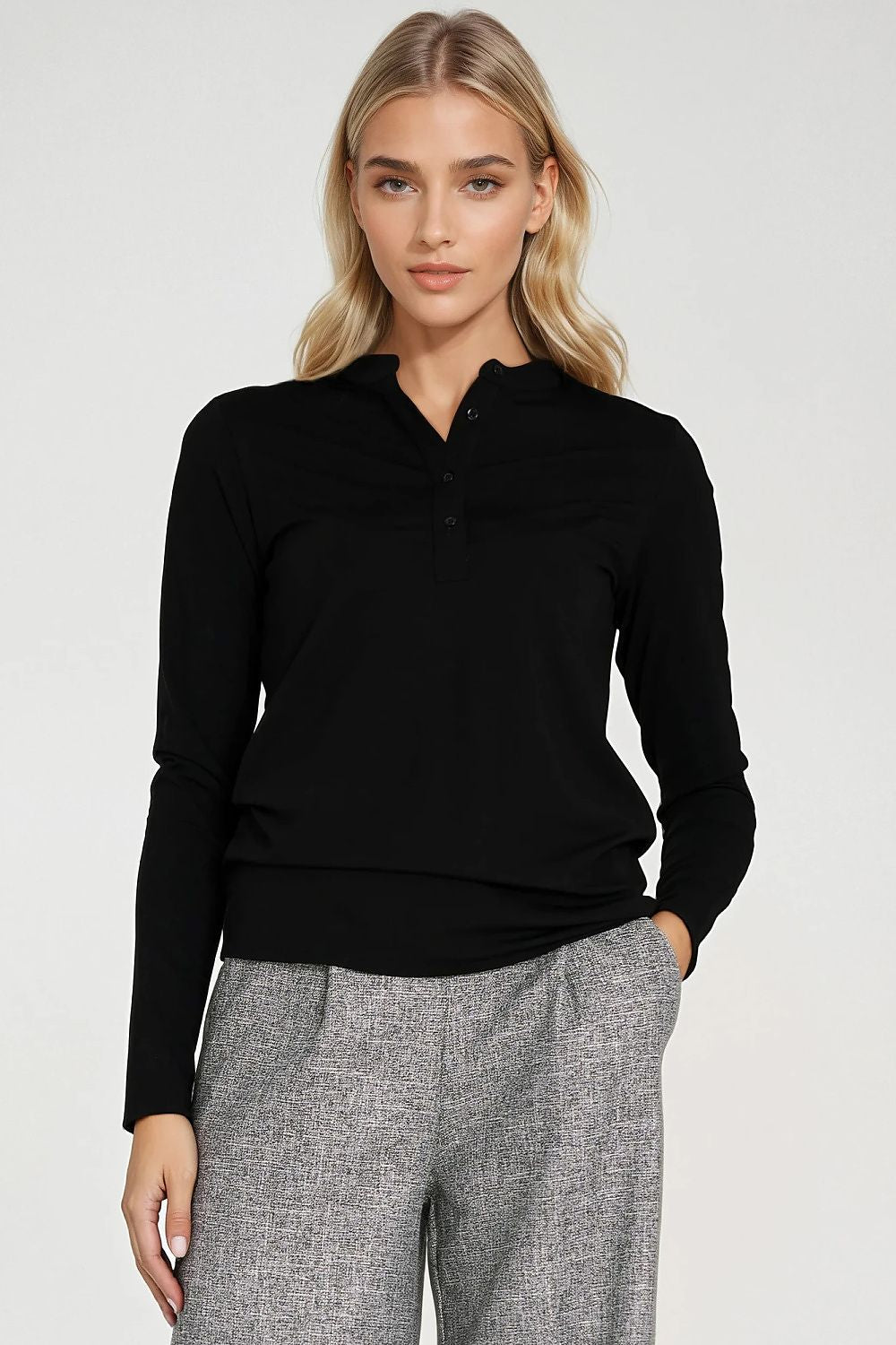 Nife woman's blouse in EU sizes 36-42, highlighting a tailored silhouette and versatile styling options for modern elegance.