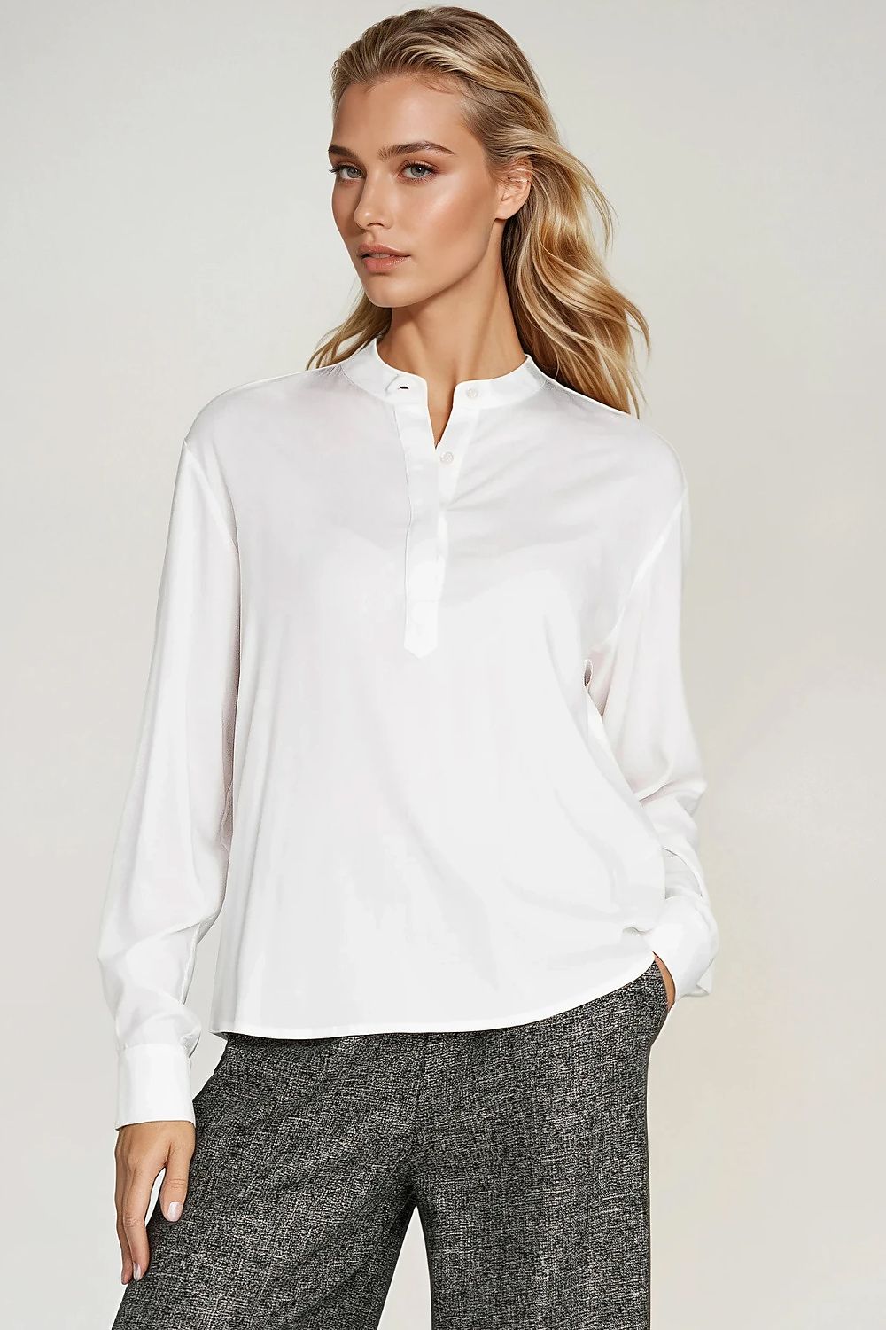 Model wearing Nife's oversized polo neck blouse, demonstrating its chic and elegant fit in EU sizes 36 to 42, ideal for everyday and office wear.