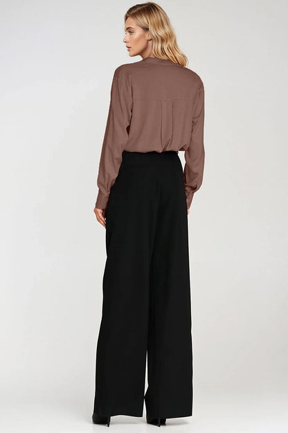 Elegant oversized polo neck blouse by Nife, crafted from lightweight viscose for a luxurious feel, showcasing a classic design with a stand-up collar and long sleeves, perfect for stylish everyday wear.