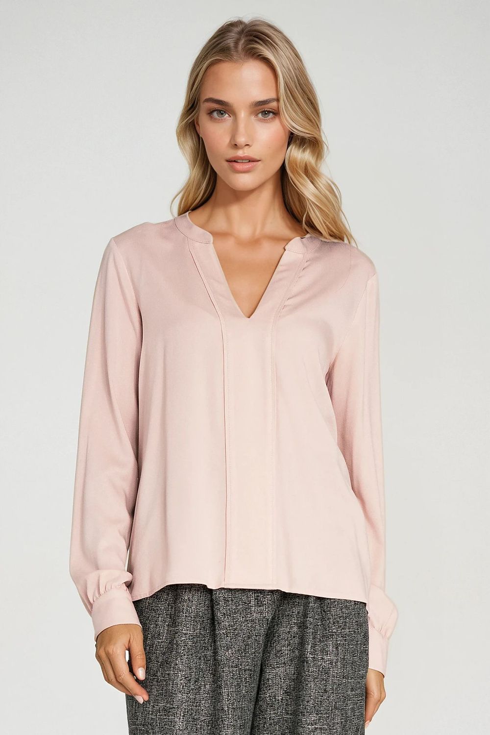 Luxurious Nife blouse with a pleated V-neck, epitomising timeless style and refined women's fashion.