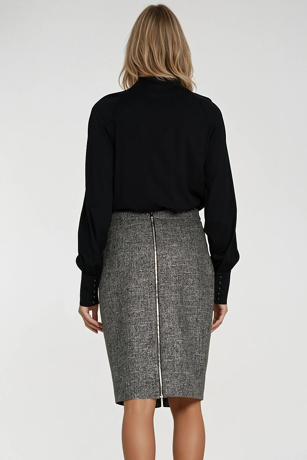 Nife women's blouse displayed on a mannequin, illustrating the elegant drape and sophisticated design suitable for a classy wardrobe.