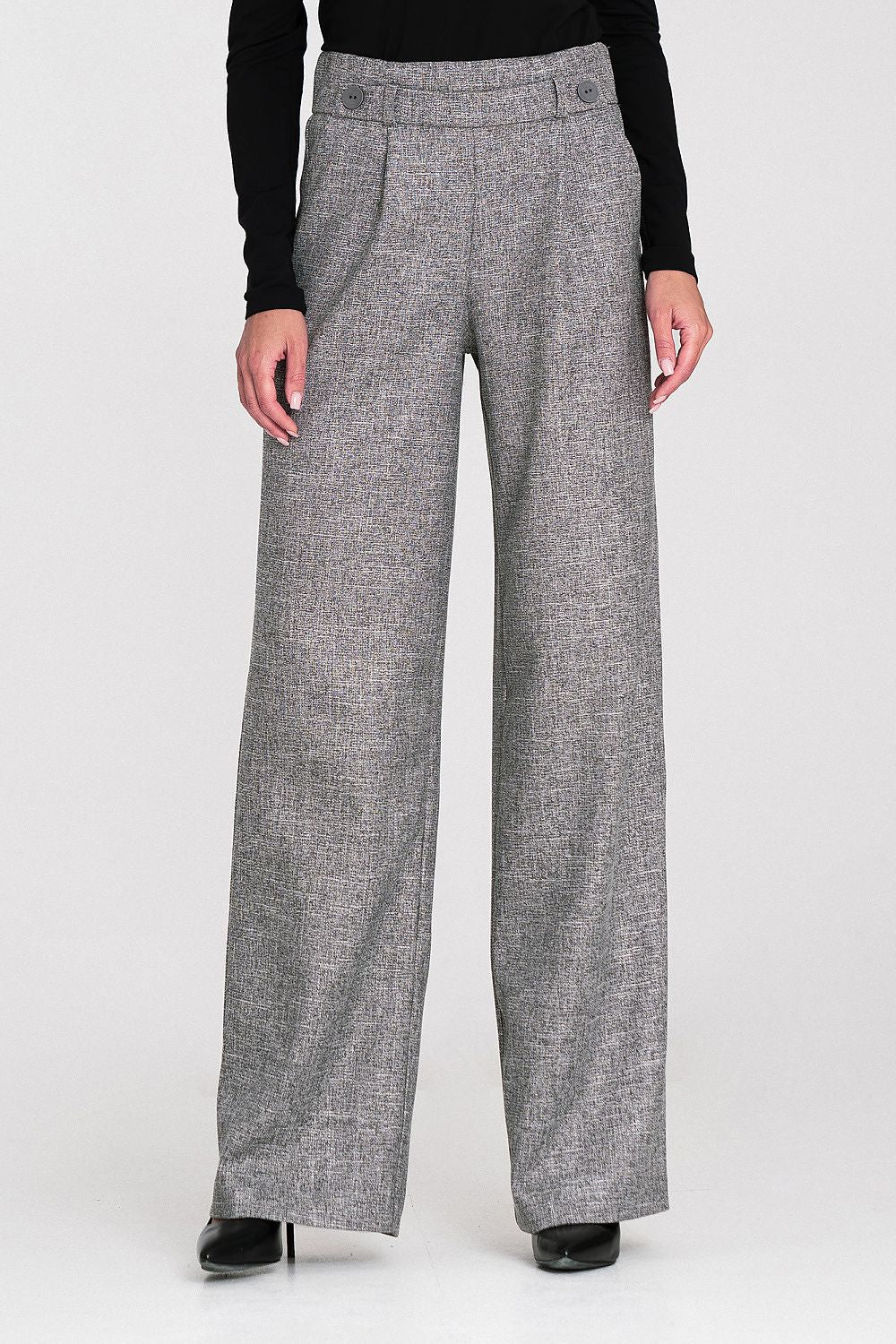 Elegant wide leg trousers by Nife in a relaxed fit, showcasing high waist design and textured fabric, perfect for stylish women's fashion.