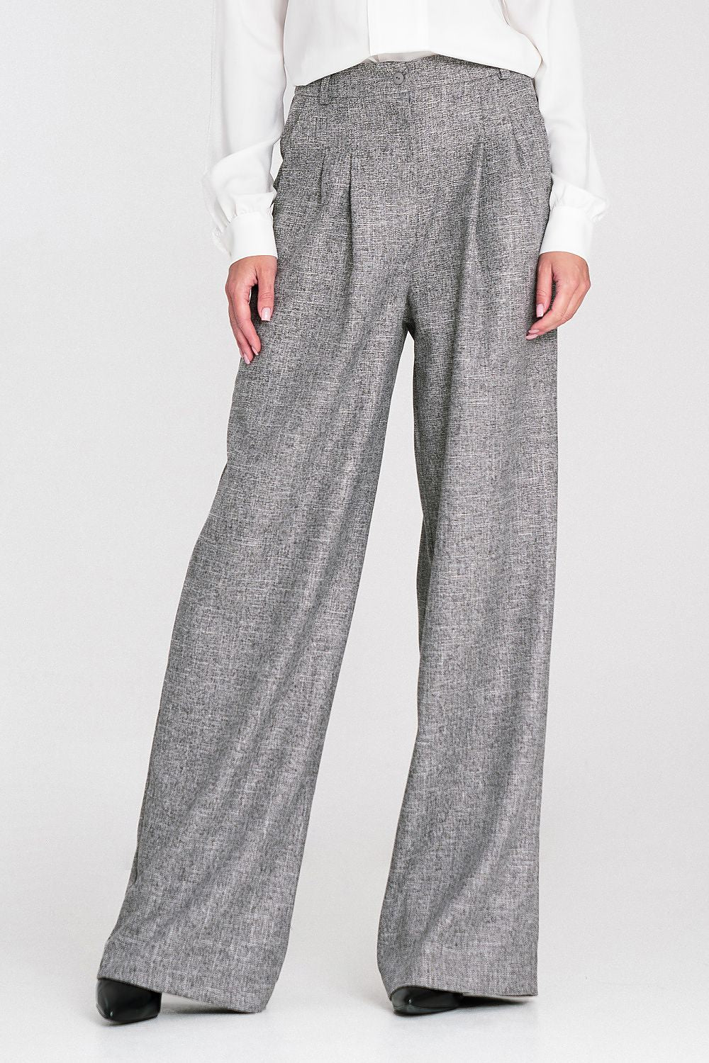 Elegant women's high-waist relaxed fit wide leg trousers by Nife, showcasing a modern melange texture and stylish design.