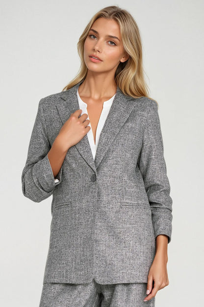 Elegant Women's Jacket by Nife with lapels and 3/4 sleeves, featuring a modern melange texture, perfect for both casual and formal occasions.