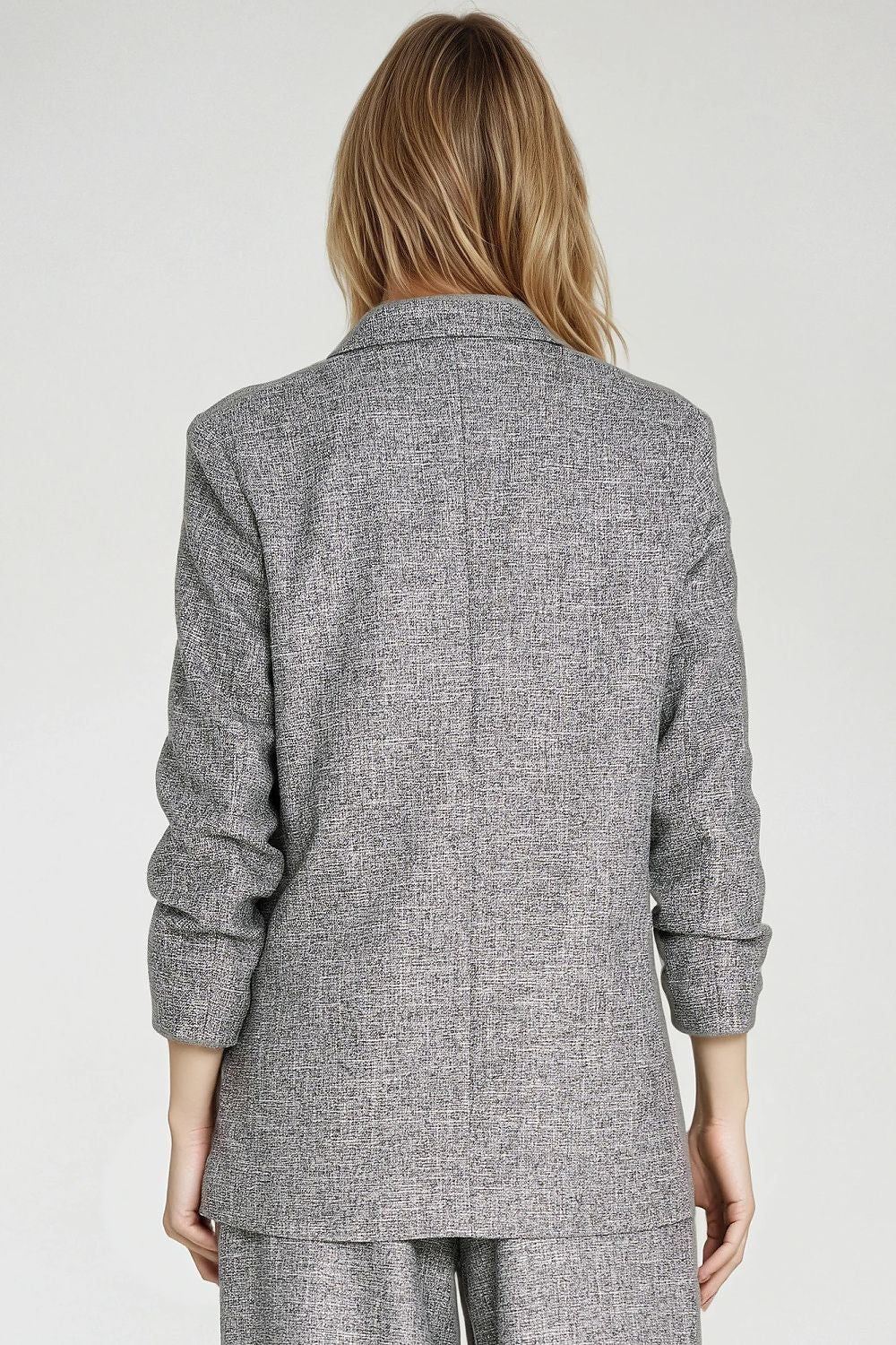 Chic women's jacket by Nife, designed with a single button fastener and imitation pockets, epitomising elegance and comfort.