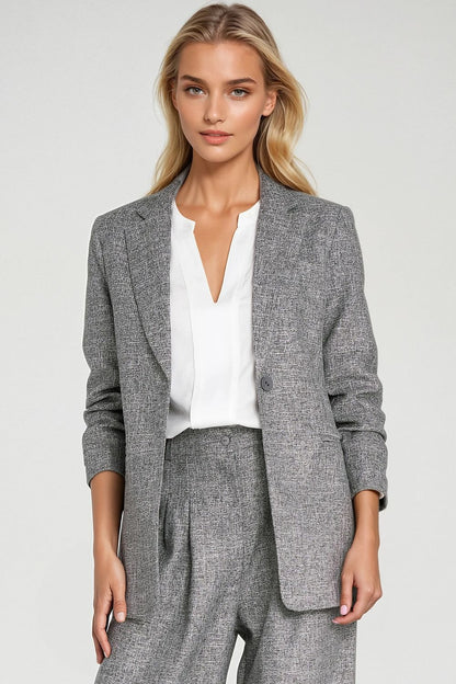 Elegant women's jacket by Nife featuring lapels and 3/4 sleeves, perfect for both casual and formal occasions.