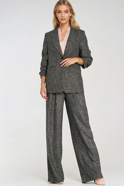 Luxurious women's jacket with delicate pleats and a single button closure, crafted by Nife for modern elegance.