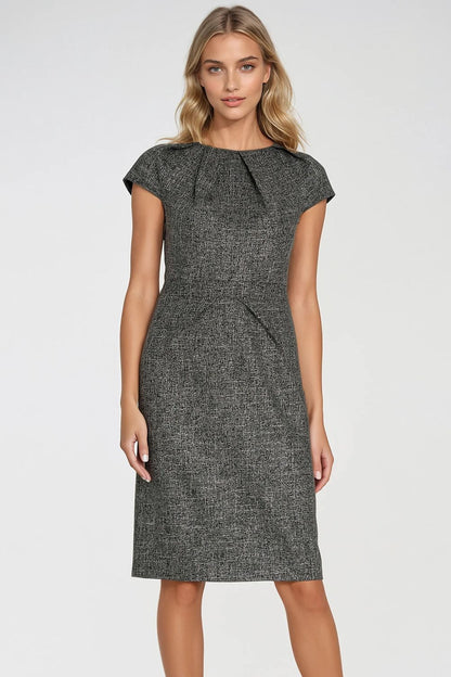 Nife women's dress displayed in EU sizes 36-42, exemplifying classic elegance with its structured fit and modern fabric texture.