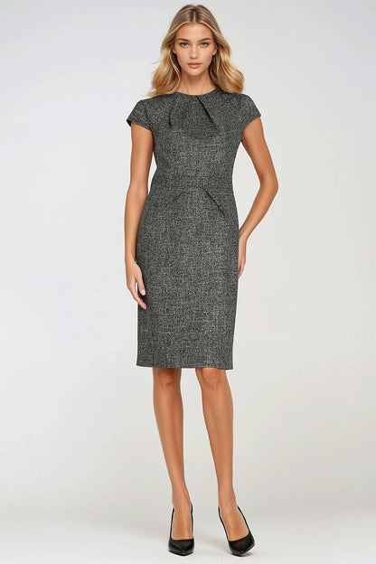 Model wearing the elegant Nife daydress in a stylish setting, perfect for formal occasions and showcasing the dress's luxurious appeal.