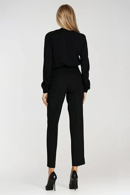High-quality tailored women's trousers by Nife in classic black, designed with pressed creases for a refined appearance.